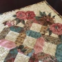 English paper piecing and needleturn applique tablerunner. A Shiralee Stitches Design